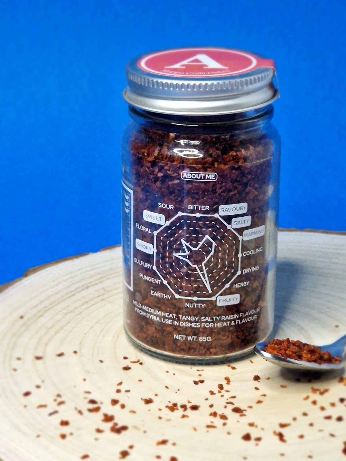 Image of Aleppo chilli flakes, featuring their rich red colour and slightly coarse texture, perfect for enhancing dishes with a mild, fruity heat and subtle tanginess