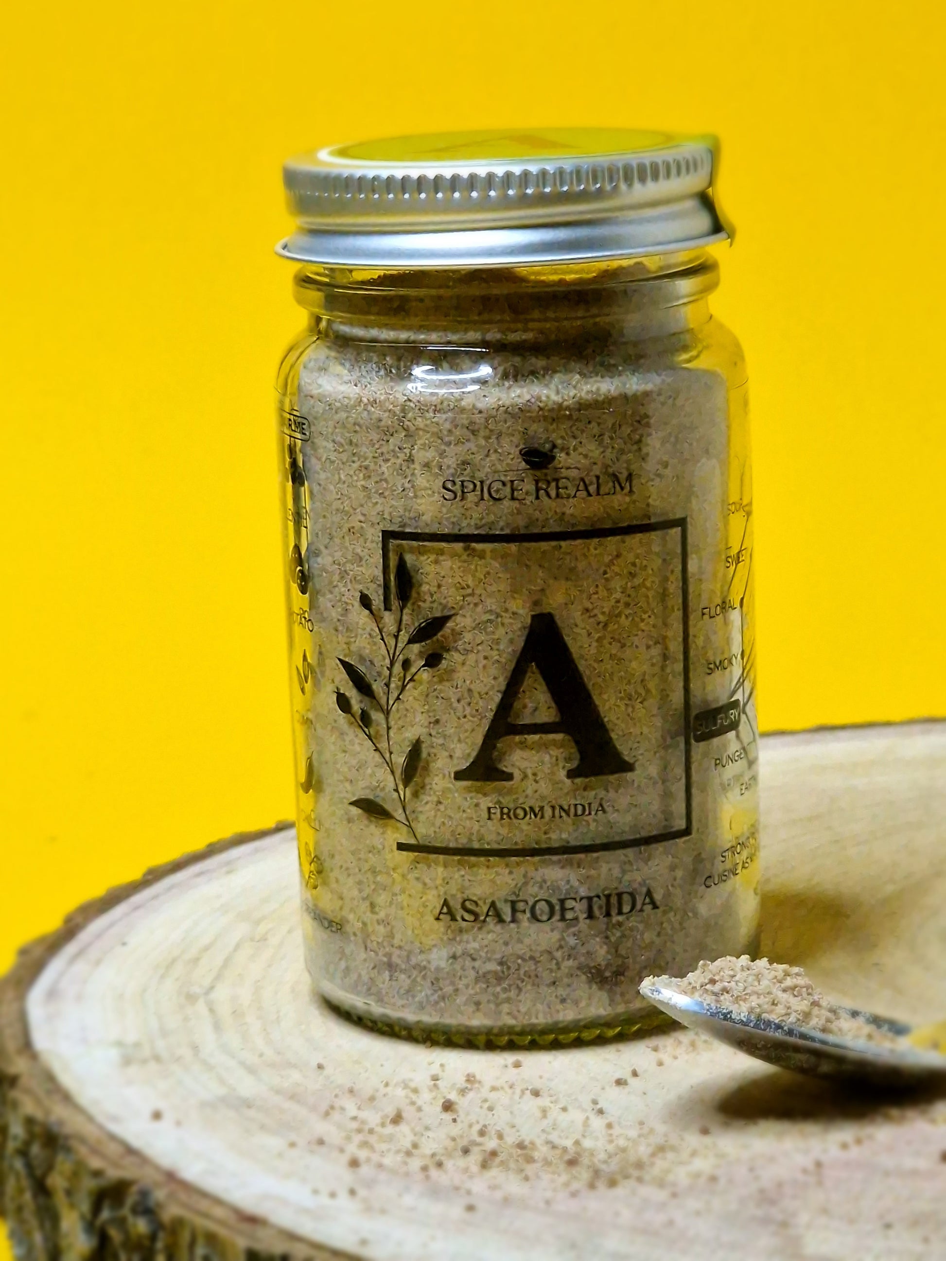 Image of asafoetida, a fine yellowish powder with a pungent aroma, commonly used in Indian cooking to add a strong, savoury flavour to curries, dals, and vegetable dishes.