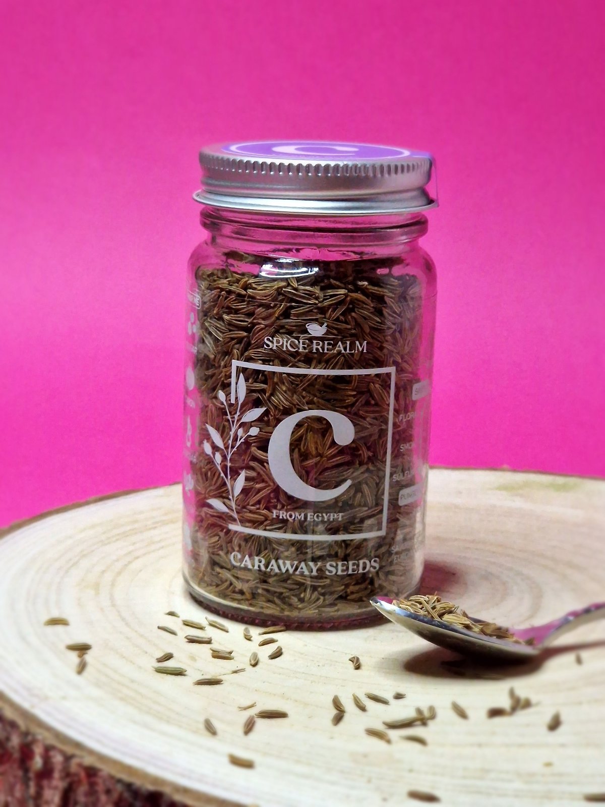 Jar of organic Caraway Seeds, showing their curved, oblong shape and light brown colour