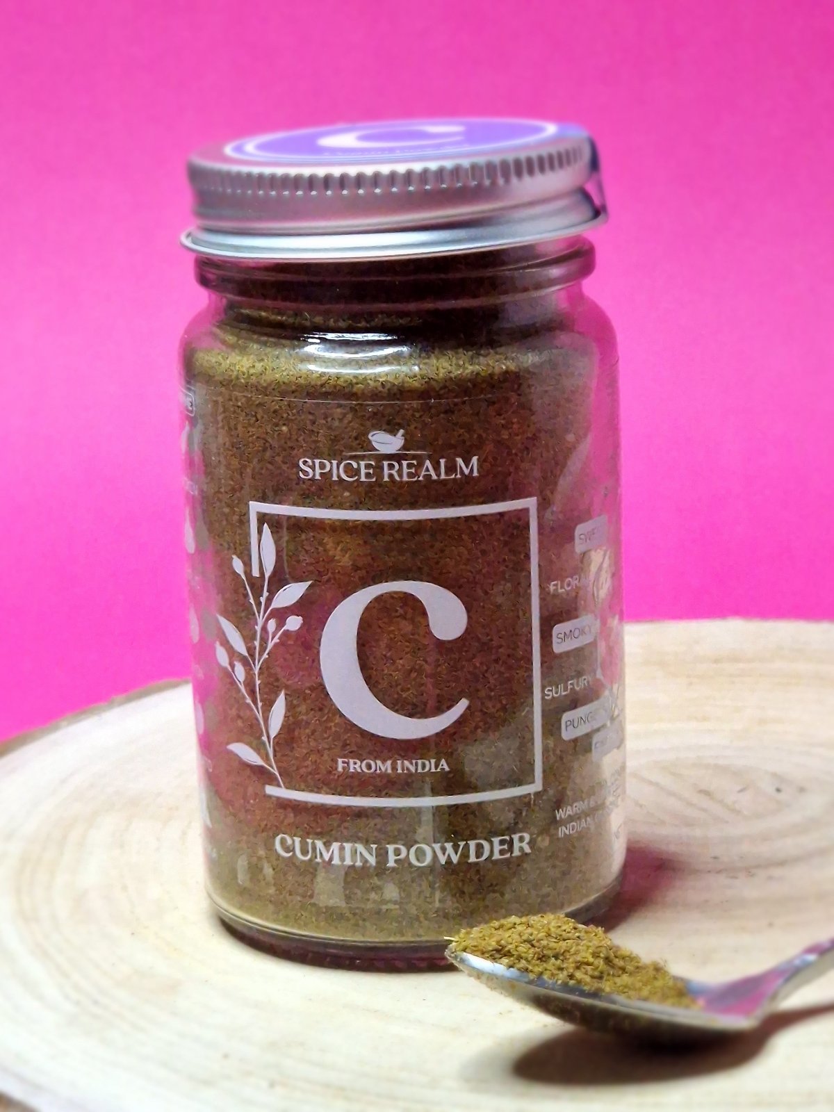 Jar of organic Cumin Powder, showcasing its warm brown colour and fine, powdery consistency