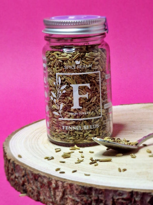 Jar of organic Fennel Seeds, showcasing their elongated shape and pale green colour