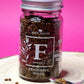 Jar of organic Fenugreek Seeds, showcasing their small, angular shape and golden-brown colour