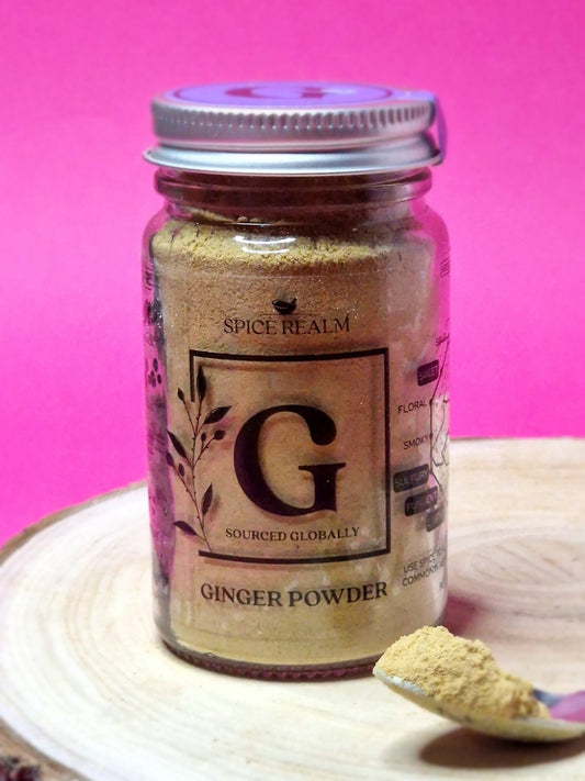 Jar of organic Ginger Powder, exhibiting its pale yellow colour and fine, powdery consistency