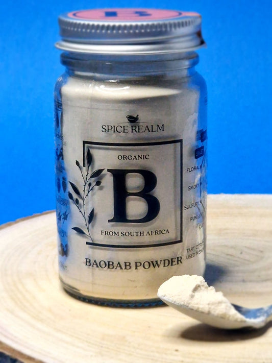 Image of baobab powder, showcasing its fine, pale texture. Known for its tangy, citrus-like flavour and rich nutrient content, it's commonly used in smoothies, drinks, and health foods.