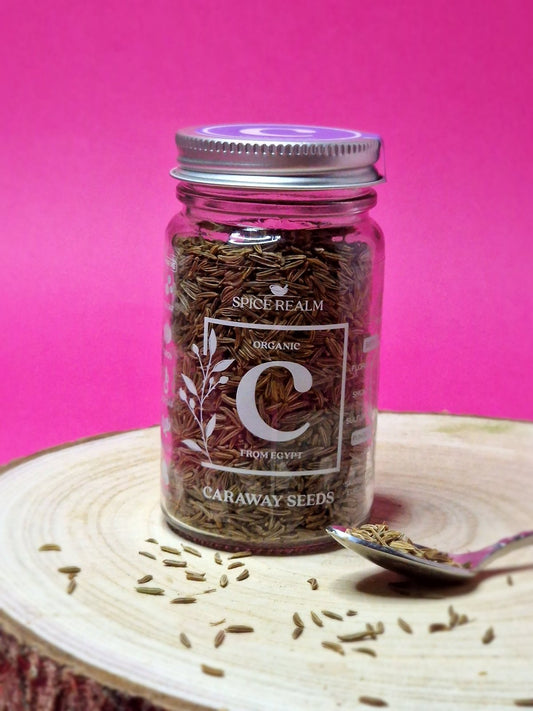 Jar of organic Caraway Seeds, showing their curved, oblong shape and light brown colour